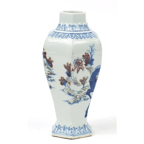 296 - Chinese blue and white with iron red porcelain hexagonal vase hand painted with an Emperor on horseb... 