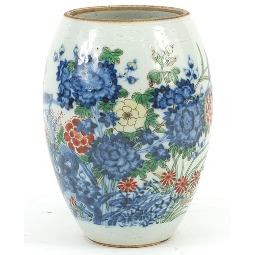 347 - Chinese wucai porcelain vase hand painted with butterflies amongst flowers, 15cm high