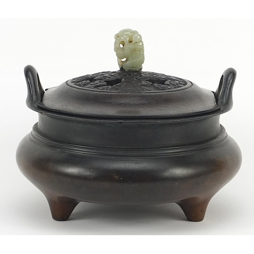 121 - Chinese patinated bronze tripod censer with hardwood lid and carved jade knop, four figure character... 