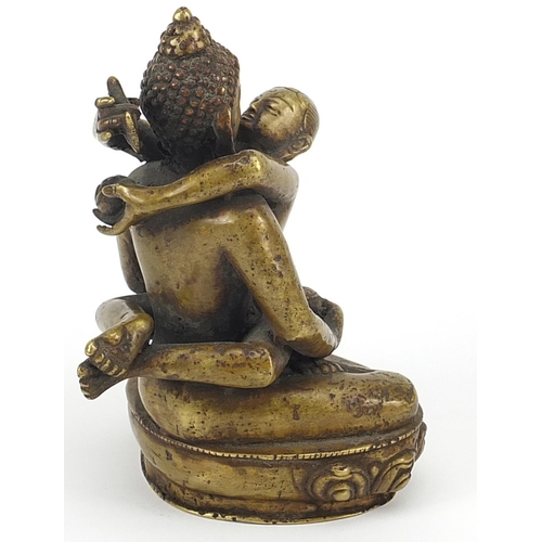 165 - Nepalese patinated bronze study of a girl with child, 18cm high