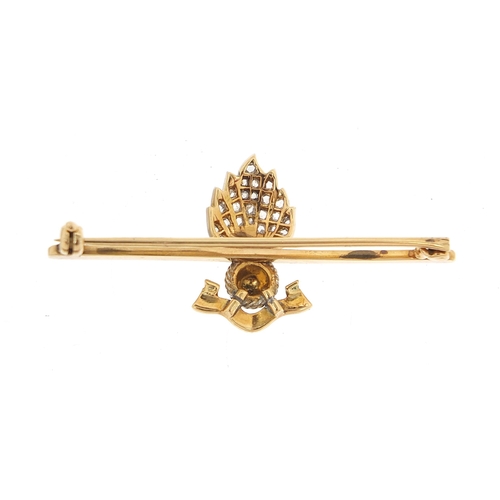 821 - Military interest unmarked gold and enamel Ubique  grenade sweetheart brooch set with diamonds, 4.5c... 