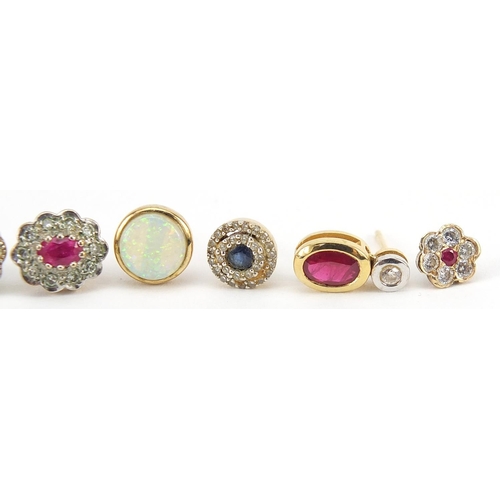 880 - Assorted gold earrings set with stones including diamonds, rubies and opal, 6.4g