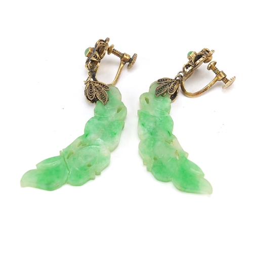 1143 - Pair of Chinese gilt metal and carved green jade drop earrings housed in a fitted box, 5.5cm high, 1... 