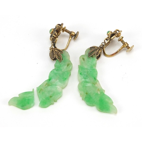 1143 - Pair of Chinese gilt metal and carved green jade drop earrings housed in a fitted box, 5.5cm high, 1... 