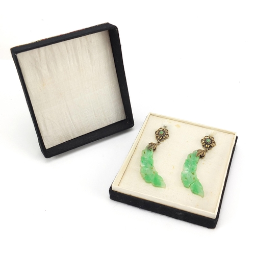 1143 - Pair of Chinese gilt metal and carved green jade drop earrings housed in a fitted box, 5.5cm high, 1... 