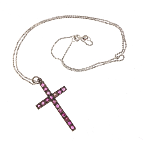 1035 - White metal purple stone cross pendant on a 9ct white gold necklace, 4.5cm high and 50cm in length, ... 