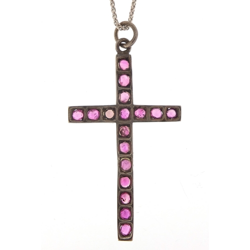 1035 - White metal purple stone cross pendant on a 9ct white gold necklace, 4.5cm high and 50cm in length, ... 