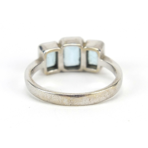 789 - 9ct white gold aquamarine three stone ring, size O/P, 4.0g