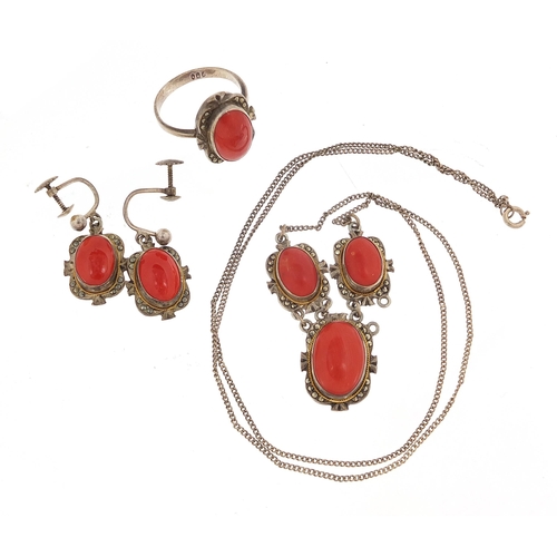 1084 - Silver cabochon coral and marcasite jewellery suite comprising necklace, earrings and ring, housed i... 