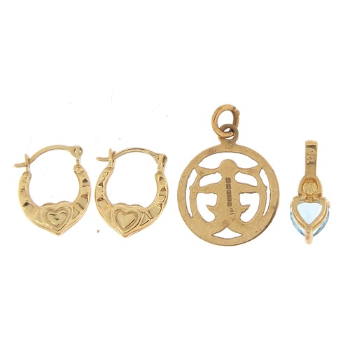 1048 - 9ct gold jewellery comprising a blue stone love heart pendant, pair of love heart hoop earrings and ... 