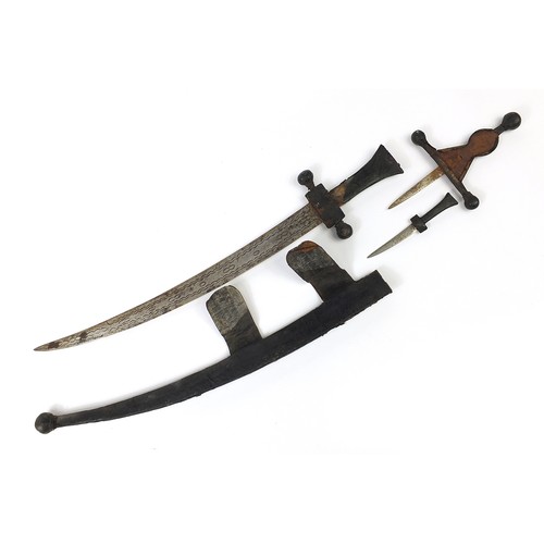 633 - Eastern steel bladed sword with dagger in the handle and leather scabbard, 100cm in length