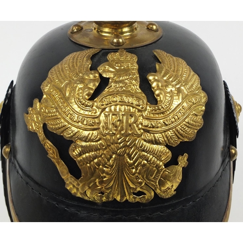 610 - German military interest Pickelhaube with brass chin strap and leather liner