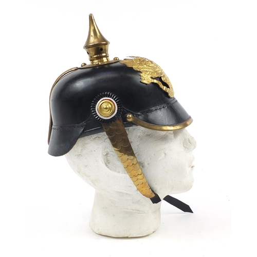 610 - German military interest Pickelhaube with brass chin strap and leather liner