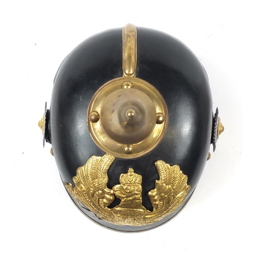 610 - German military interest Pickelhaube with brass chin strap and leather liner