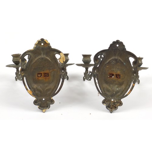 1761 - Pair of bronzed cast metal two branch wall sconces, each 22cm high