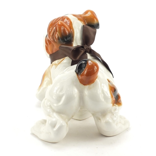 1748 - Hand painted porcelain model of a Bulldog, 38cm in length