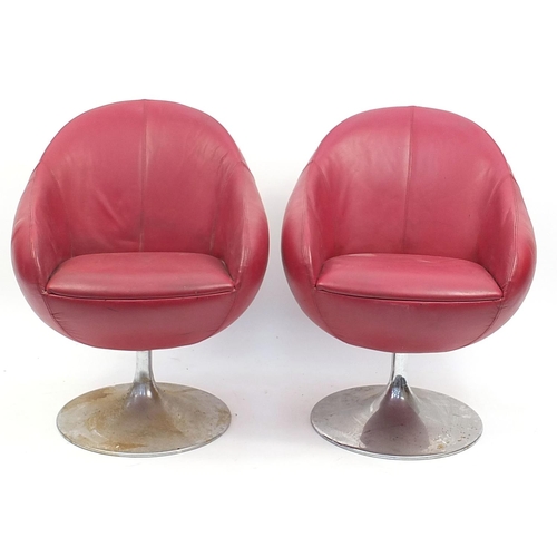 655 - Pair of vintage egg type tub chairs, signs of paper labels to the underside, each 78cm high