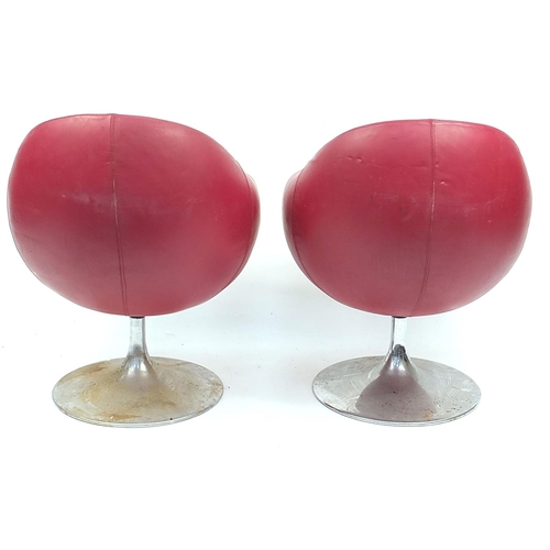 655 - Pair of vintage egg type tub chairs, signs of paper labels to the underside, each 78cm high