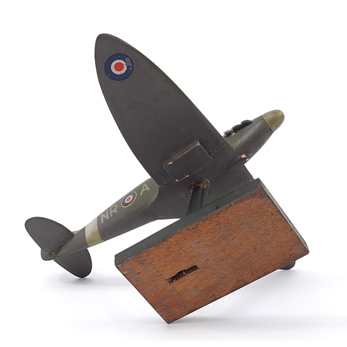 608 - Military interest hand painted wooden model of a Spitfire, inscribed made by Flight Lieutenant Ralph... 