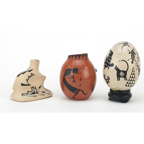 1378 - Native American New Mexico Pueblo pottery including a vase hand painted with a spider's web, the lar... 