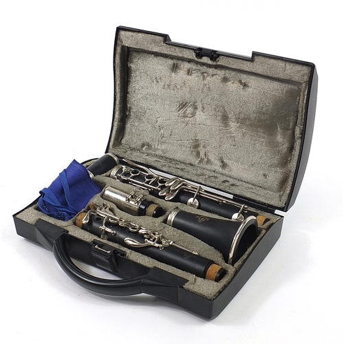 704 - Buffet four piece ebonised clarinet retailed by Crampon & Co, Paris, housed in a fitted box