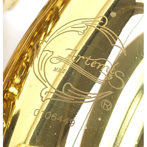 699 - Artemis MKII brass saxophone numbered 0106449,  housed in a fitted case