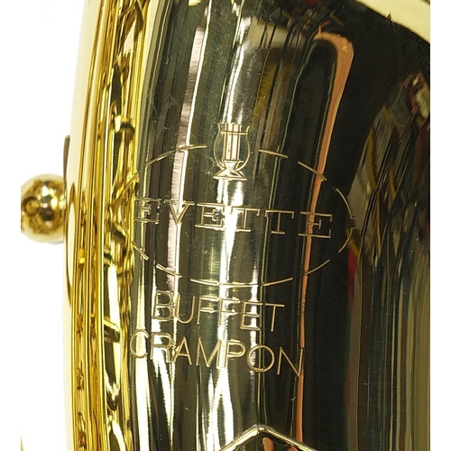 701 - Evette Buffet Crampon brass saxophone, housed in a fitted case, 60cm in length