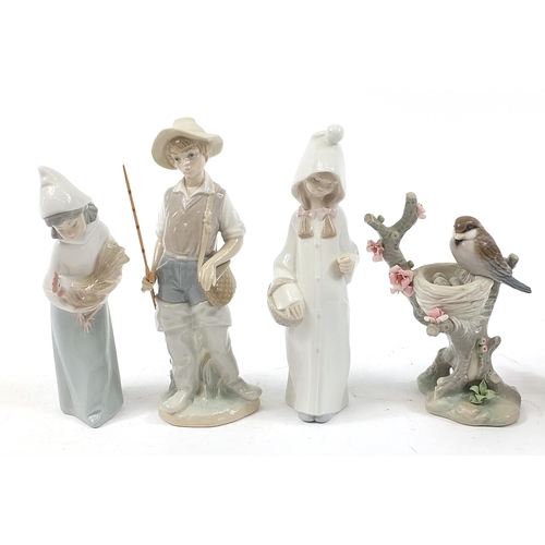 501 - Seven Lladro figure and animal groups including Young Fisherman and Girl with Puppy, the largest 21.... 