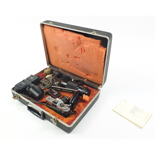 1874 - Canon FTb camera with lenses and accessories, housed in a fitted protective case