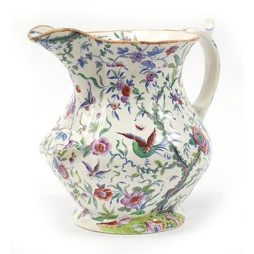 1233 - Large Victorian India stone china jug decorated with birds amongst flowers, 31cm high