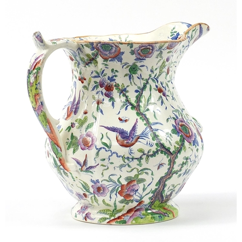 1233 - Large Victorian India stone china jug decorated with birds amongst flowers, 31cm high