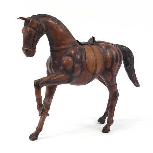 1226 - Large leather covered horse in the style of Liberty, 50cm in length