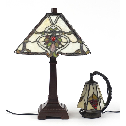 522 - Two Tiffany design bronzed lamps with leaded shades, the largest 43cm high