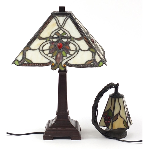 522 - Two Tiffany design bronzed lamps with leaded shades, the largest 43cm high