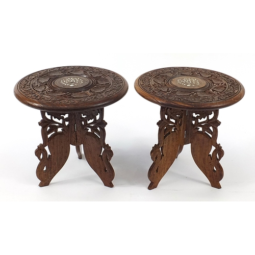 1517 - Pair of Anglo Indian carved wood occasional tables, each 29cm high x 30cm in diameter