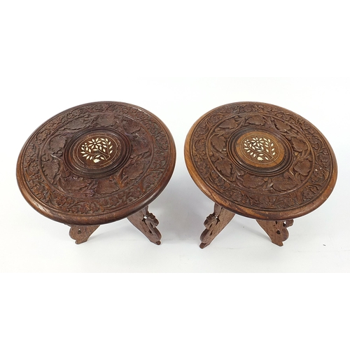 1517 - Pair of Anglo Indian carved wood occasional tables, each 29cm high x 30cm in diameter