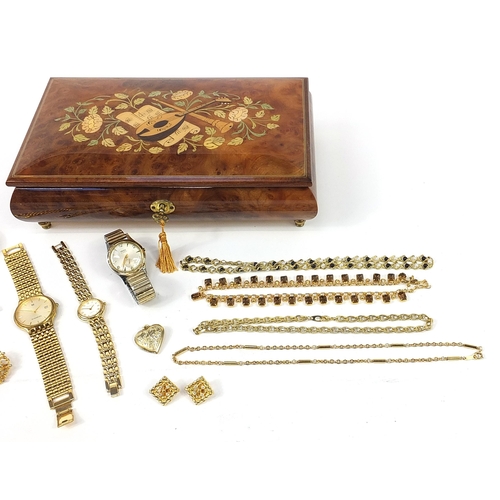 1730 - Costume jewellery and wristwatches arranged in an inlaid music jewellery box including wristwatches,... 