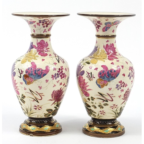 322 - Pair of continental pottery vases, probably by Zsolnay Pecs hand painted with butterflies and flower... 