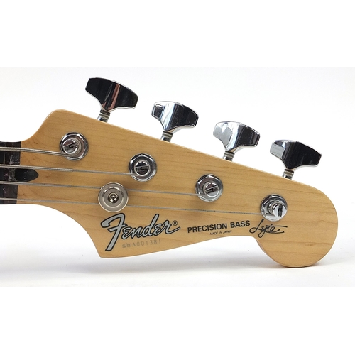 712 - Fender Precision Bass electric guitar, serial number A001381, with protective carry case