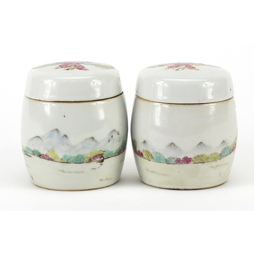 397 - Pair of Chinese porcelain pots and covers hand painted in the famille rose palette with children, ea... 