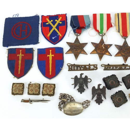 593 - Militaria including World War II stars, Weingarten's wristwatch, Totem lighter and buttons