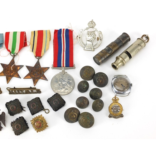 593 - Militaria including World War II stars, Weingarten's wristwatch, Totem lighter and buttons