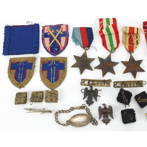 593 - Militaria including World War II stars, Weingarten's wristwatch, Totem lighter and buttons