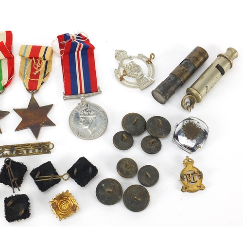 593 - Militaria including World War II stars, Weingarten's wristwatch, Totem lighter and buttons