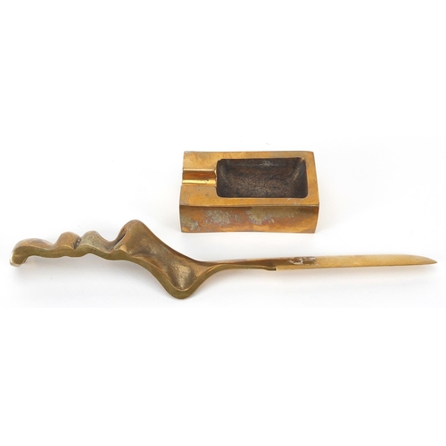 1267 - Modernist bronze letter opener and stamp roller, the letter opener 23.5cm in length