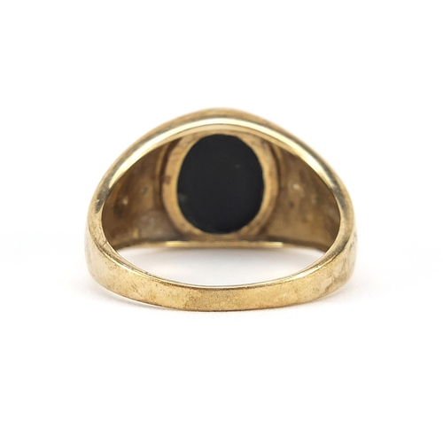 896 - 9ct gold black onyx signet ring with diamond set shoulders, size T, 4.3g