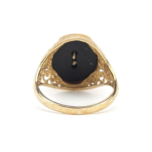 792 - 9ct gold black onyx tiger head ring with pierced shoulders, size R, 4.0g