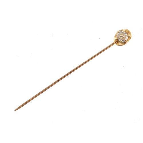 877 - Unmarked gold diamond solitaire stick pin, 6cm high, 1.3g