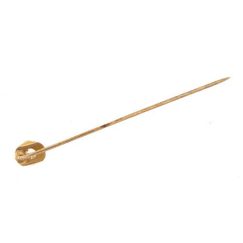 877 - Unmarked gold diamond solitaire stick pin, 6cm high, 1.3g