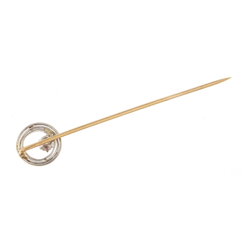 779 - Unmarked gold diamond solitaire stick pin, 6cm in length, 2.3g